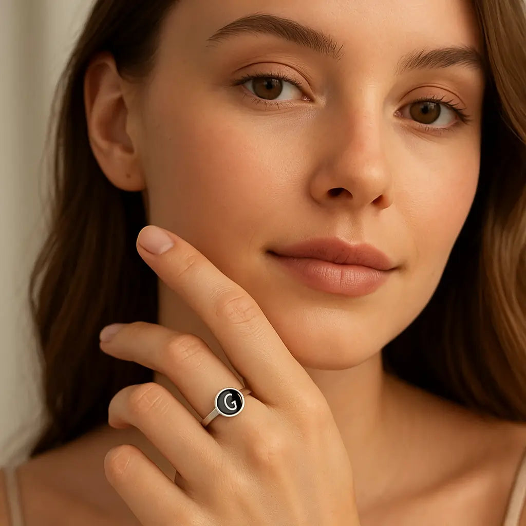 Minimalist Custom Alphabet Ring worn by woman with initial design.