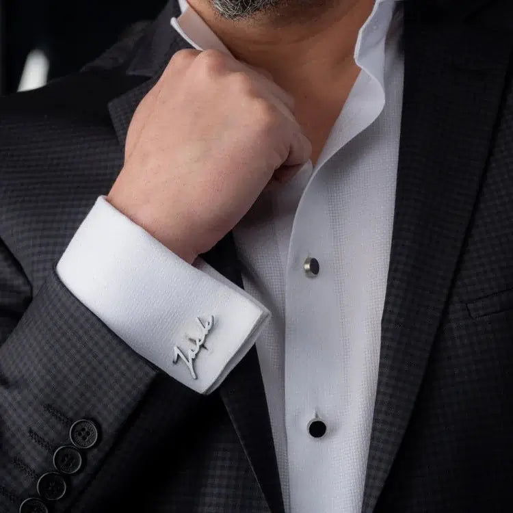 Name Cuff Brooch on white shirt cuff with luxury suit styling.