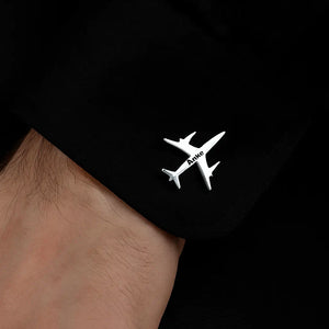 Silver Pilot Cuff Pin with engraved airplane design worn on black cuff.