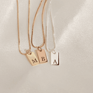 Ankx.in custom initial letter necklace in gold, rose gold, and silver with engraved initials