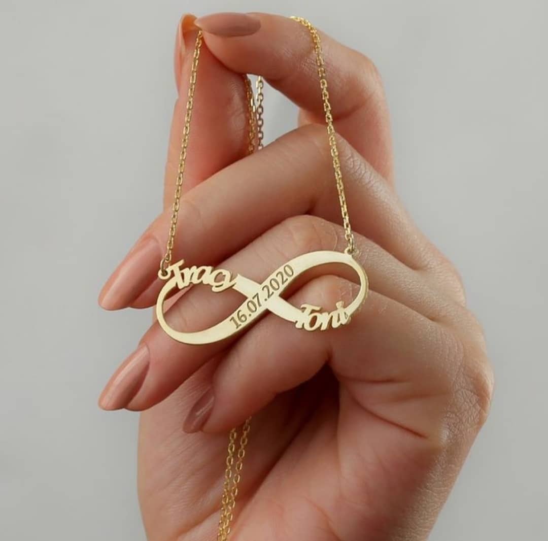 Gold infinity pendant couple name necklace with date 16 07 2020 by Ankx.in