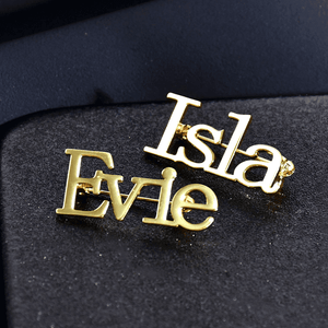 Personalized name brooch combo featuring gold Isla and Evie name brooches for a unique accessory