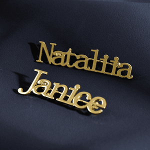 Personalized name brooch combo featuring gold nameplates 'Natallia' and 'Janice' for custom accessory lovers