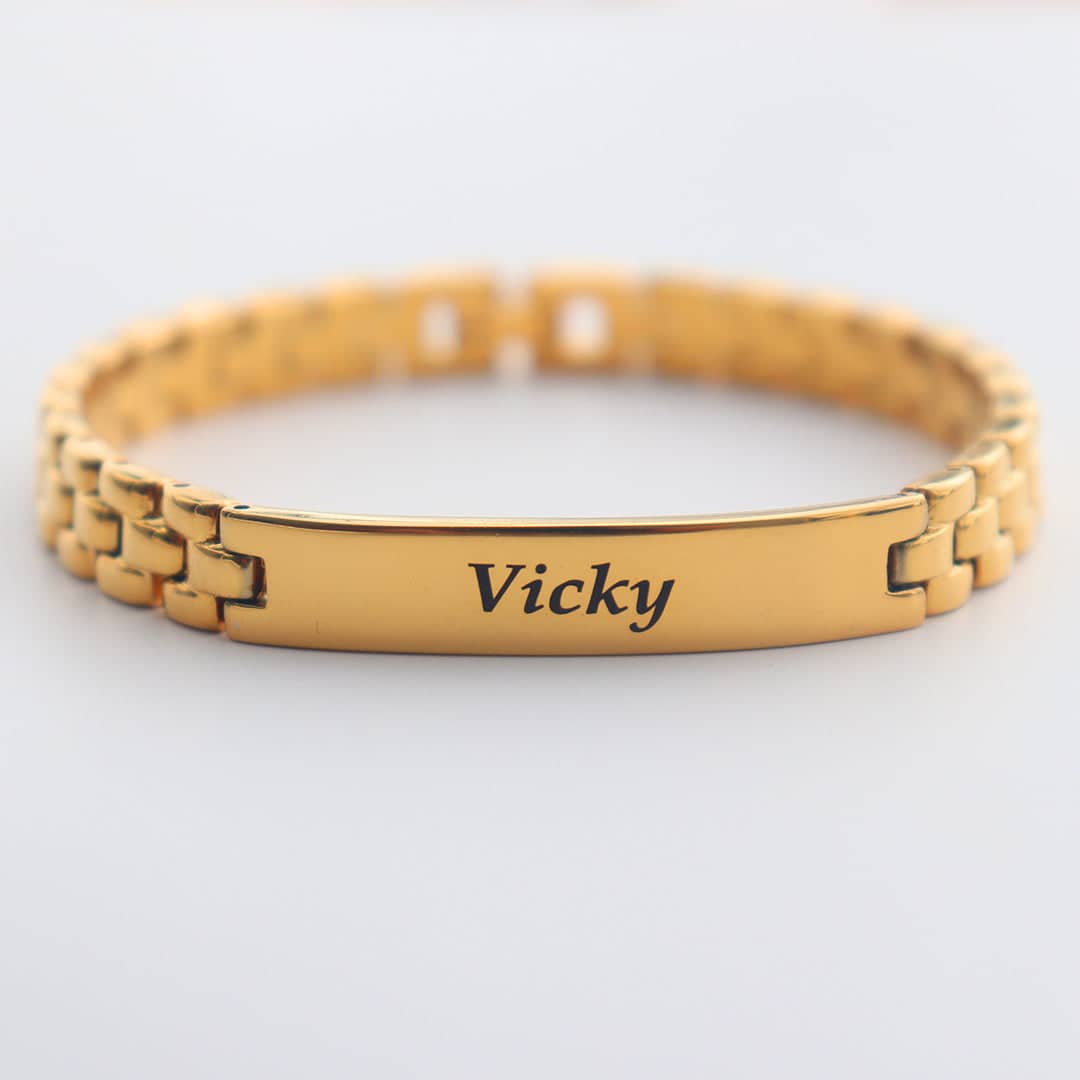 Gold Chain Name Bracelet with personalized engraving of the name Vicky by Ankx.in