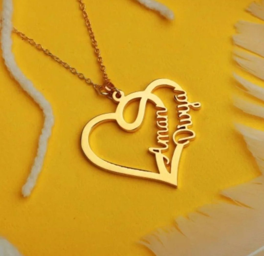 Ankx.in gold heart-shaped couple name necklace pendant with names Aman and