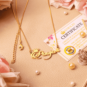Gold Ankx.in Name Bracelet with elegant cursive design and authenticity certificate on display