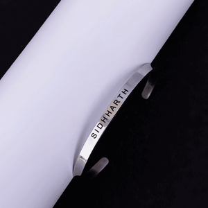 Silver metal Name Bracelet engraved with the name Sidharth from Ankx.in
