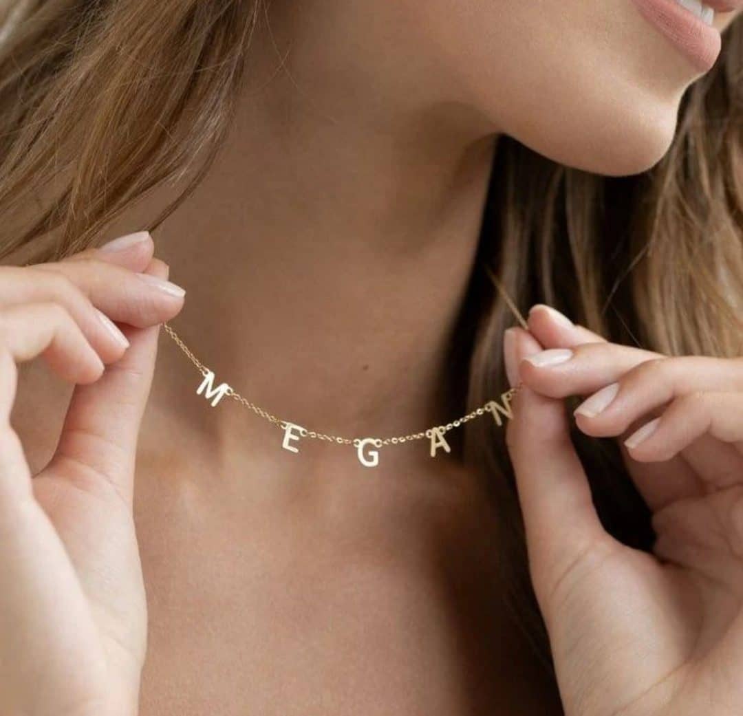 Gold Name Necklace Letters Choker with individual letter charms worn by woman from Ankx.in