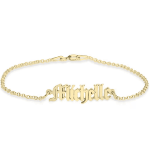 Gold custom name bracelet featuring the name Michelle in elegant lettering