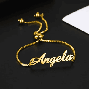 Custom name chain bracelet in gold featuring the name Angela with an adjustable clasp