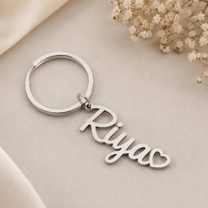 Stylish Name Keychain with 'Riya' Text and Heart Design in Silver Finish