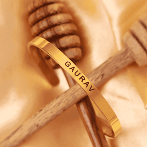 Customized name chain online India featuring a personalized bracelet with the name Gaurav engraved in gold