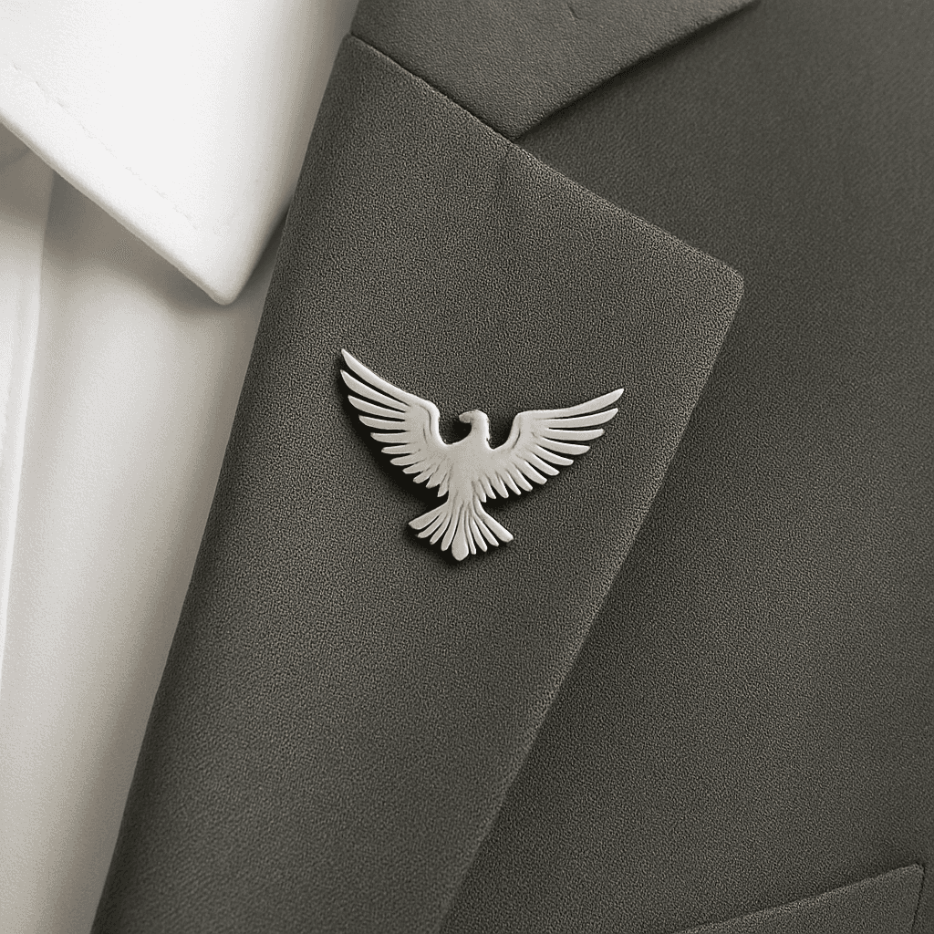 Stylish silver bird brooch on men’s blazer – luxury lapel pin for formal outfits