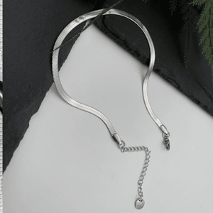 Minimal silver anklet for women with adjustable chain and heart charm detail