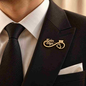 Personalised Couple Name Brooch in gold with engraved names Kabir and Diya on a stylish lapel
