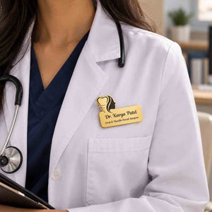 Personalised Doctor Name Brooch in gold finish with space for name on a white lab coat
