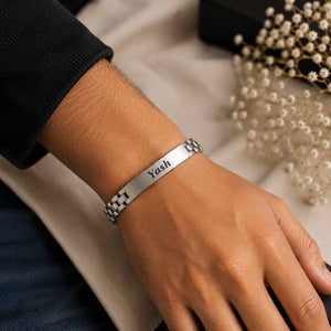 Personalised silver chain name bracelet with Yash engraving worn on hand custom jewellery for men