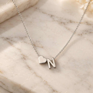 Personalized Heart Initial Necklace with silver finish featuring heart and N initial on a delicate chain