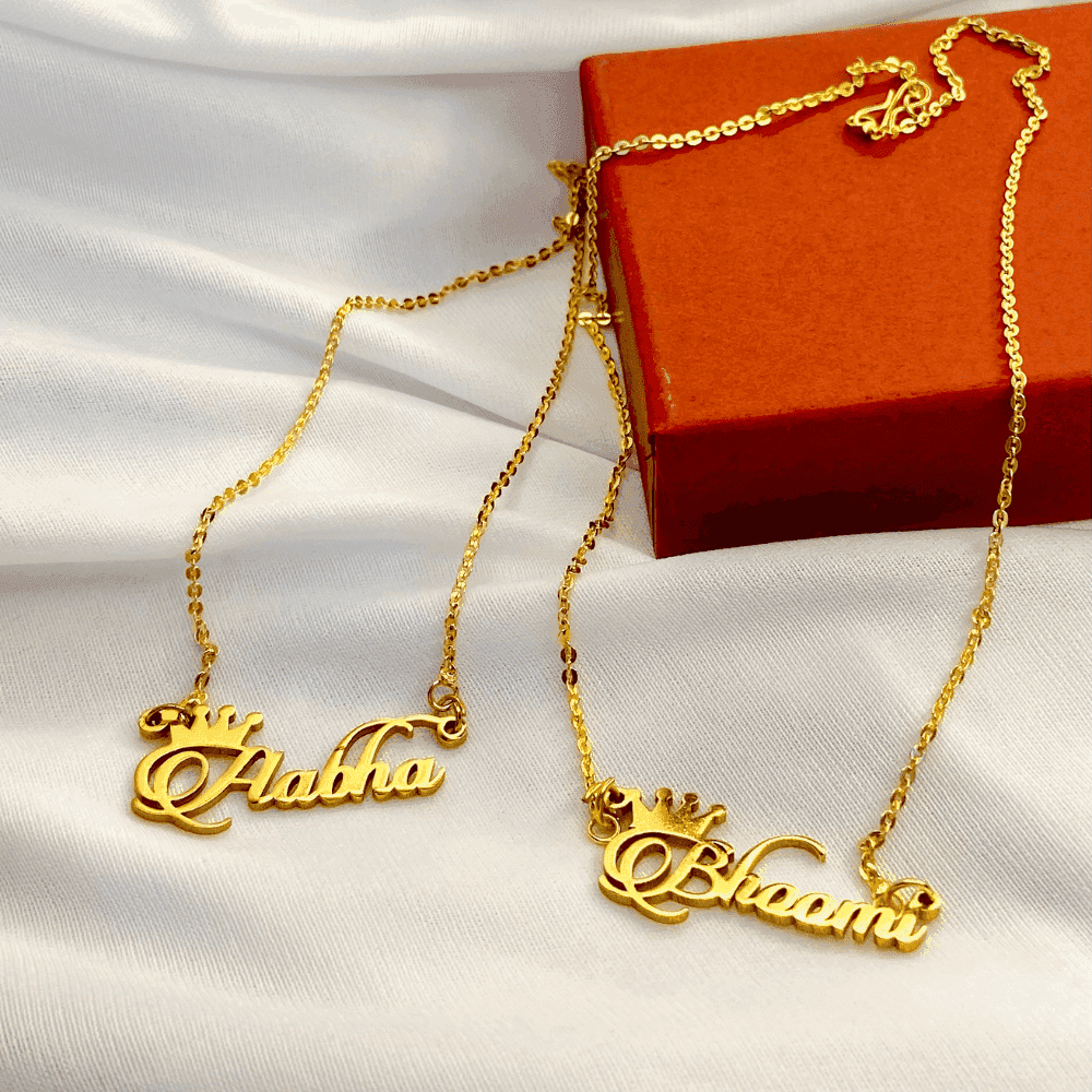 Personalized name necklace combo featuring two gold nameplate necklaces in elegant script