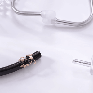 Personalized stethoscope name tag in rose gold with floral design, perfect for medical professionals
