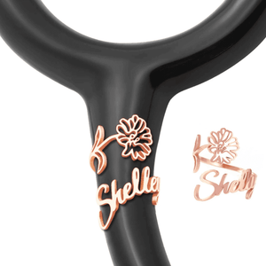 Personalized stethoscope name tag with floral design featuring the name Shelley in rose gold color