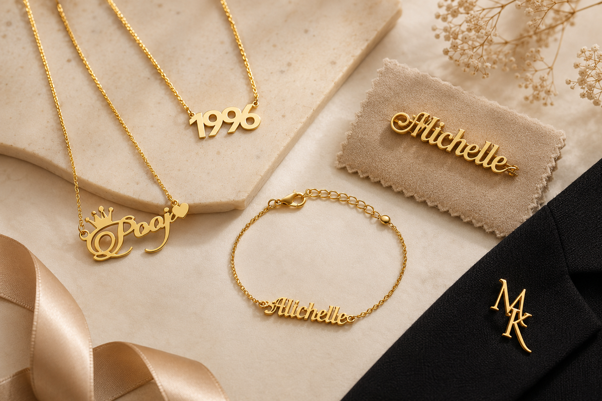 Luxury personalized jewelry flat lay featuring custom name necklace, birth year necklace, personalized name brooch, custom name bracelet, and initial lapel pin in gold on a premium neutral background by Ankx