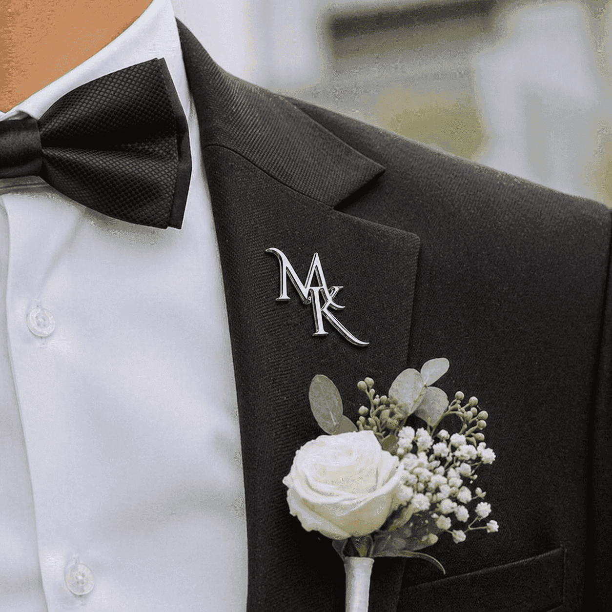 Personalized initial lapel pin worn on black suit jacket custom monogram brooch by ANKX