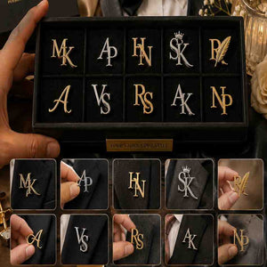 Monogram initial pins in a display box with close-up shots on suit lapels.
