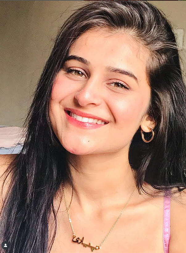 "Personalized Arabic name necklace in gold."