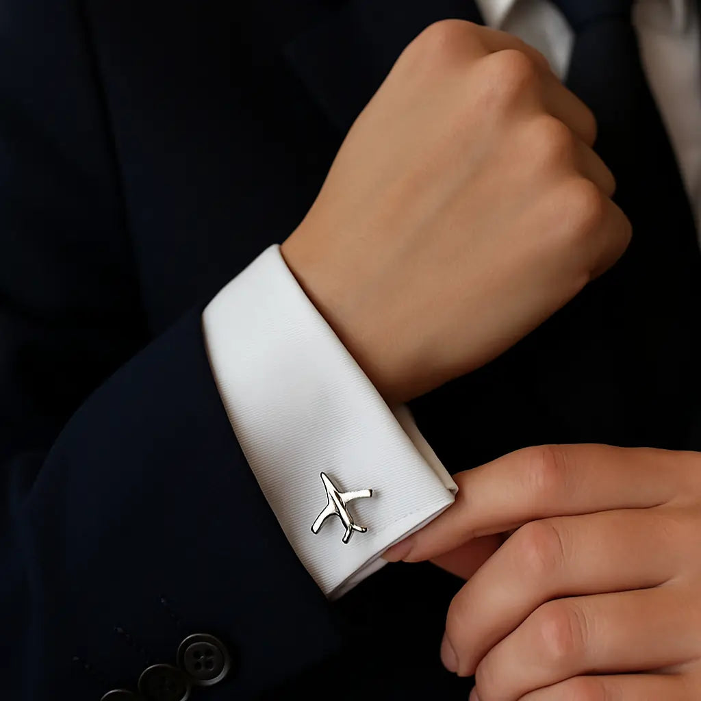 Pilot Cuff Pin airplane design on white shirt cuff with formal suit.