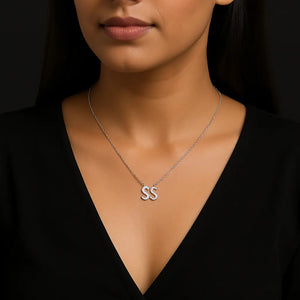 Silver dual letter necklace “SS” with crystals worn by a woman – personalized initial jewelry