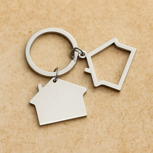 Stainless steel custom date keychain on celebration table with balloons and cake