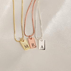 Ankx.in custom initial letter necklace in gold, rose gold, and silver with engraved initials