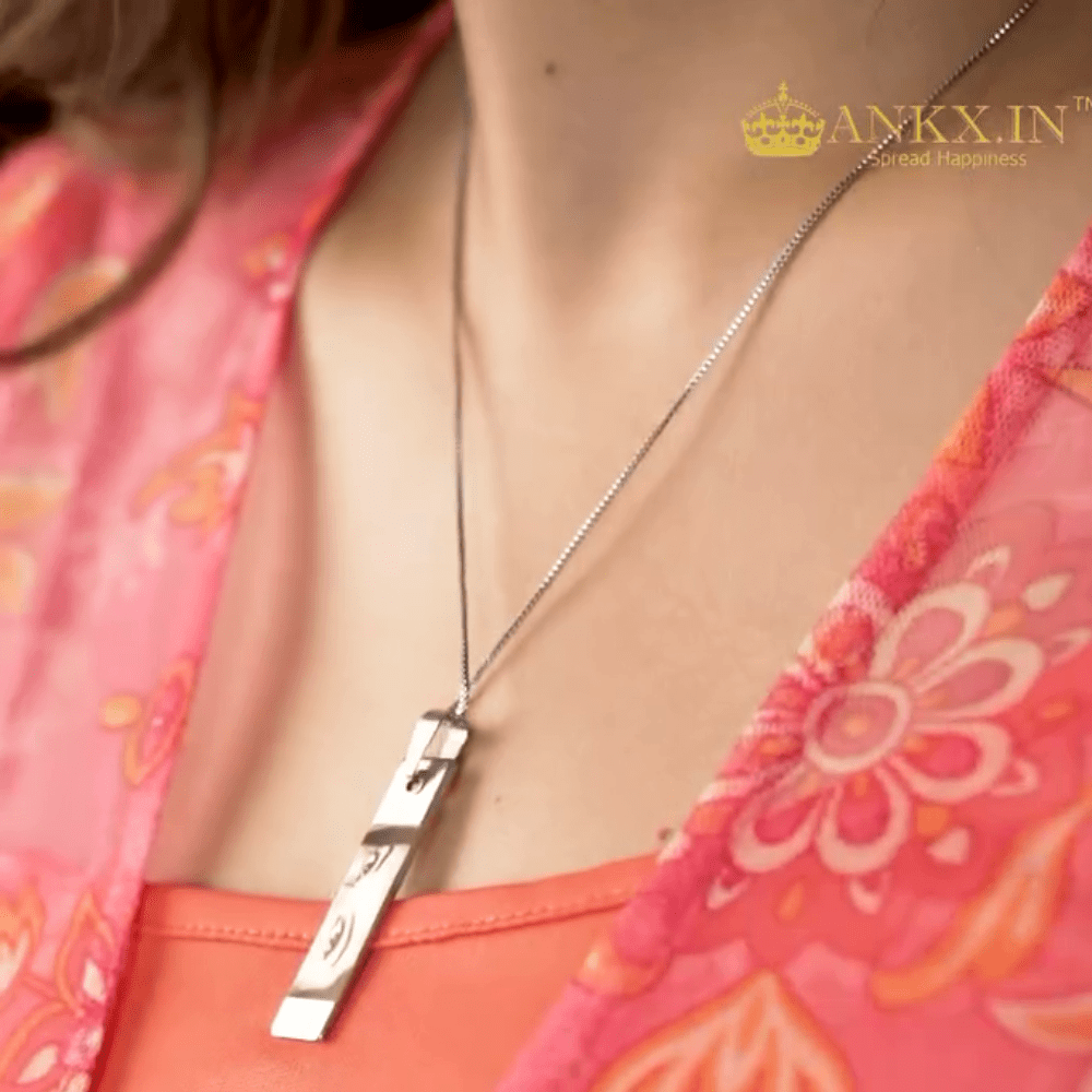 Stylish photo necklace from Ankx.in featuring a sleek silver design, perfect for personal keepsakes