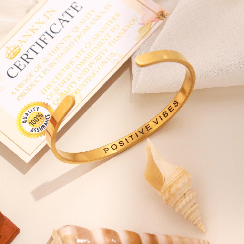 Gold tone Name Bracelet with positive vibes engraving by Ankx in stylish open cuff design