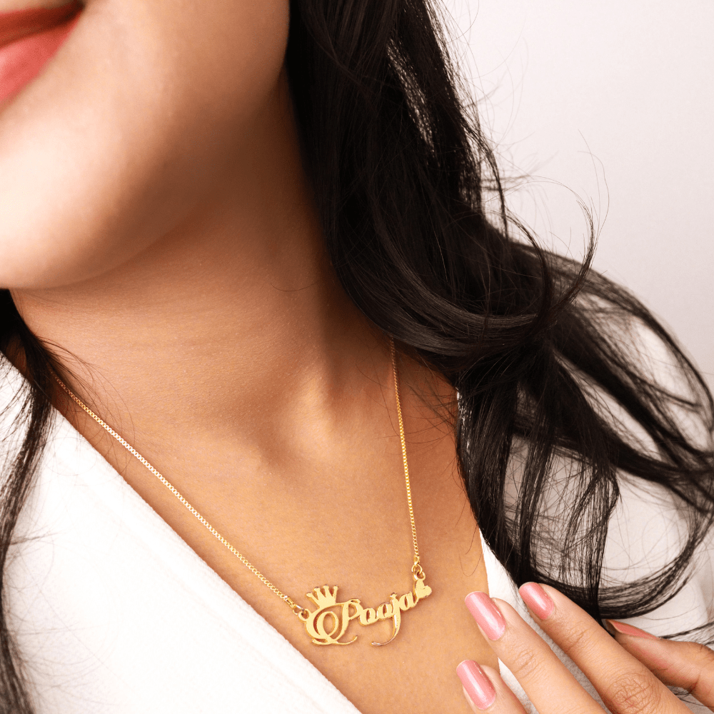 Gold Name Necklace Crown And Heart with personalized name pendant worn by woman with black hair