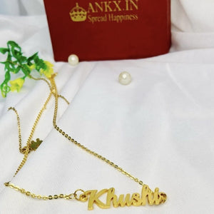 Personalised jewellery pieces featuring a gold necklace with the name Khushi on it