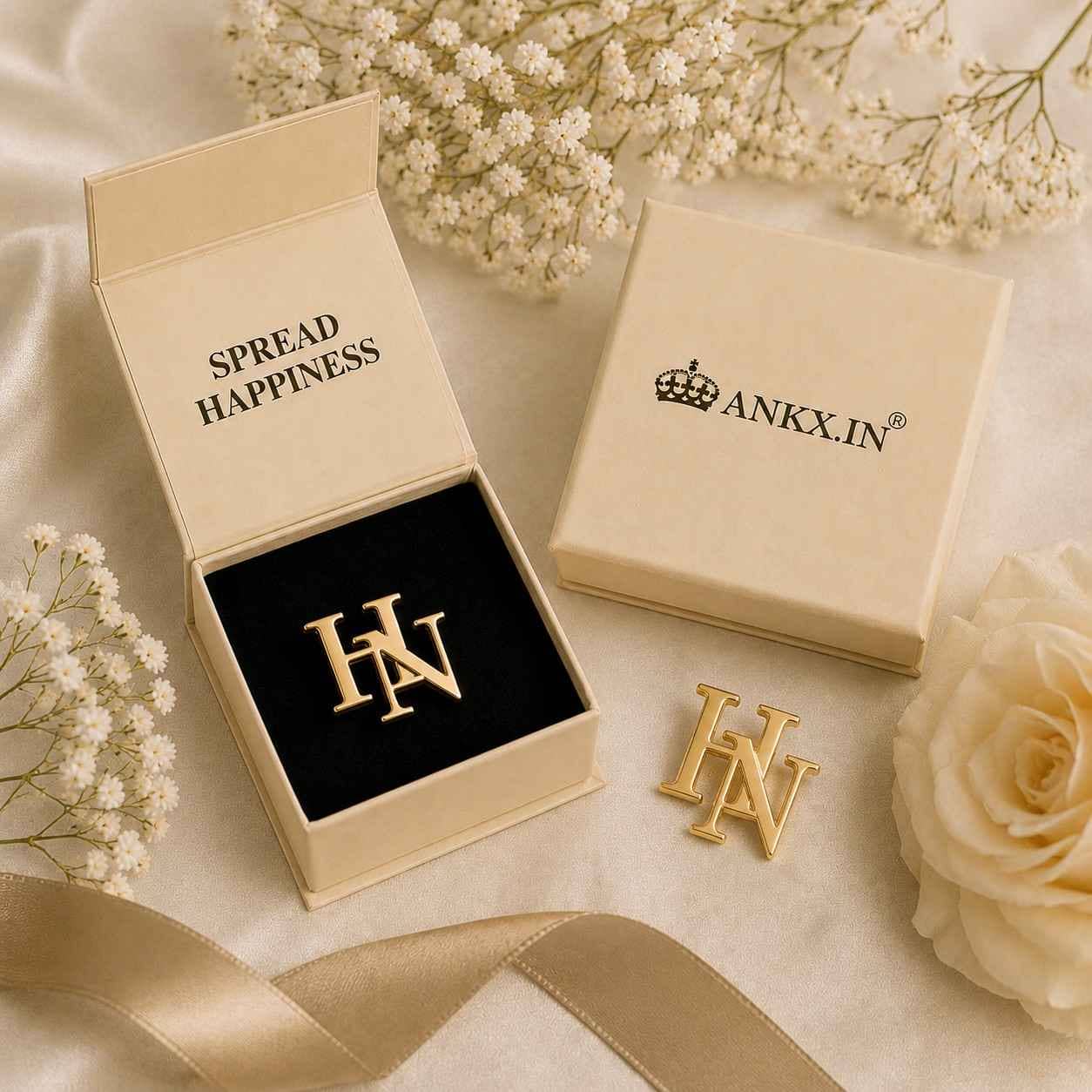 Custom initials brooch for men in a gold finish, presented inside a premium ANKX branded gift box.