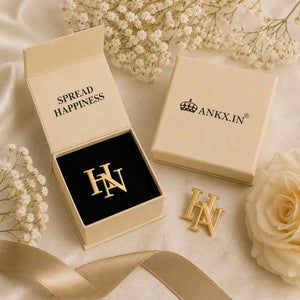 Custom initials brooch for men in a gold finish, presented inside a premium ANKX branded gift box.