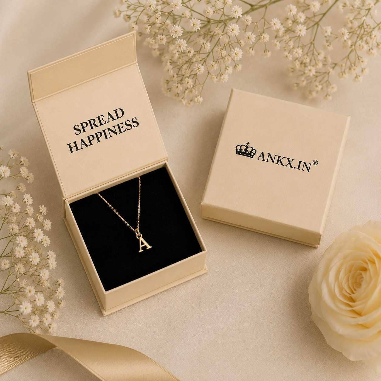 Custom gold initial letter necklace featuring the alphabet A, beautifully presented in an ANKX branded gift box