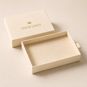 Custom jewelry boxes in elegant cream color with a logo on the top for personalized gifts
