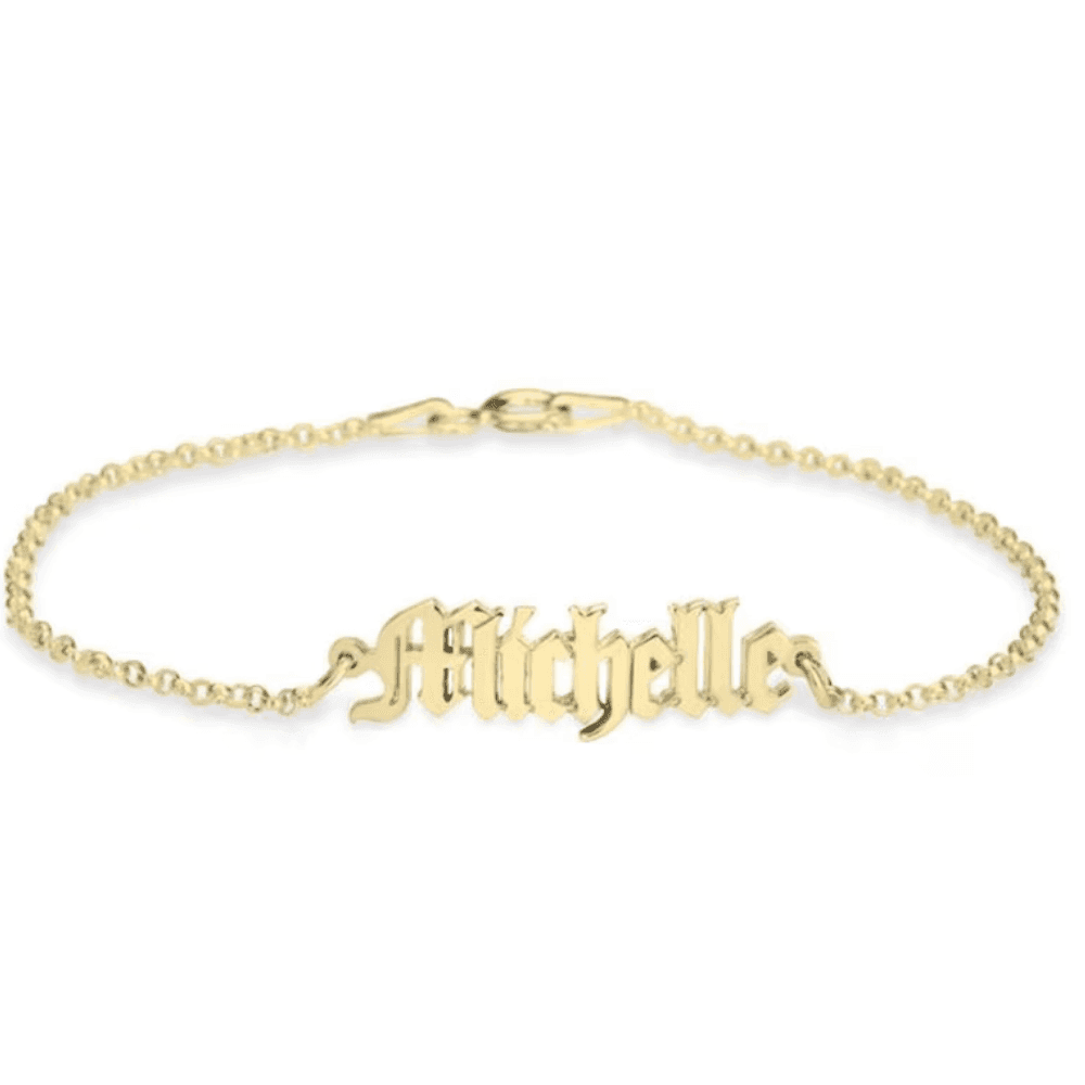 Gold custom name bracelet featuring the name Michelle in elegant lettering