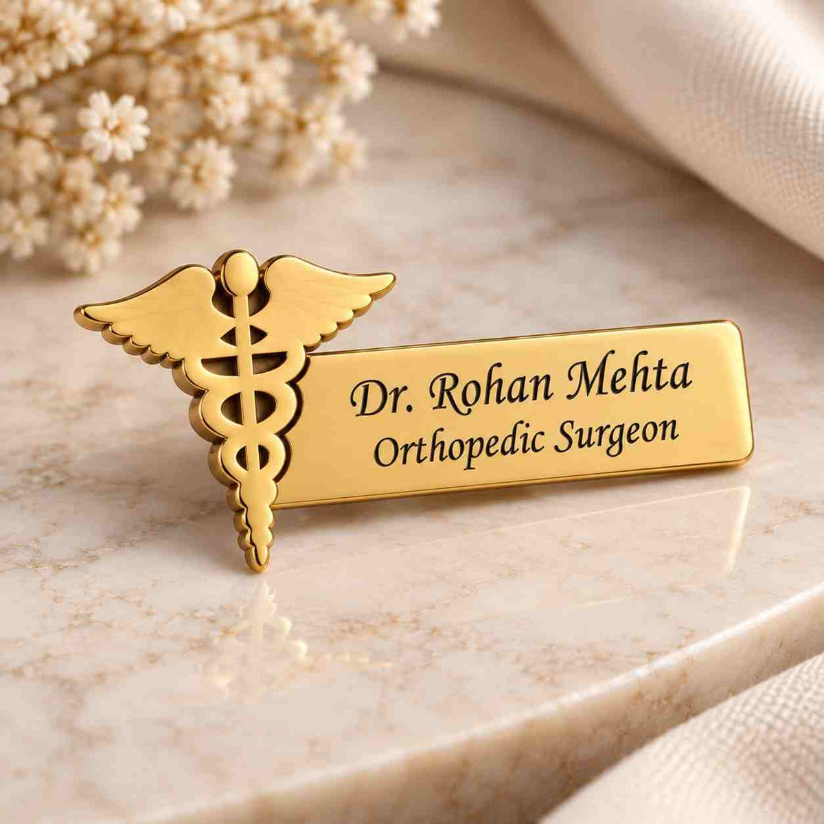 Gold Doctor Name Badge featuring Dr. Rohan Mehta and caduceus symbol for orthopedic surgeons
