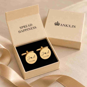 Personalized gold wedding cufflinks with initials and date in an elegant gift box