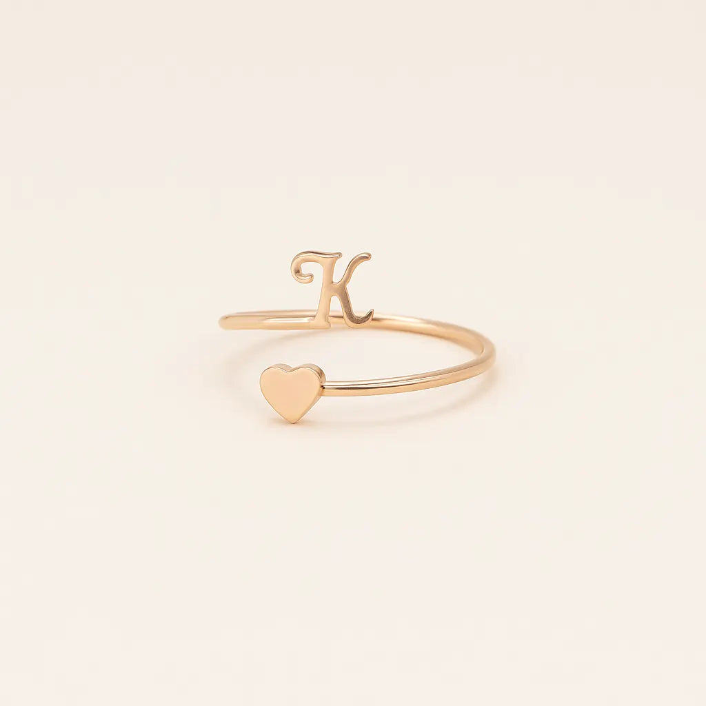 Minimalist gold Initial Heart Ring product close-up.
