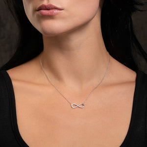 Stylish silver Infinity Necklace displayed on a model for a chic jewelry look
