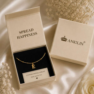 Initial anklet gift box with letter E charm and ANKX packaging