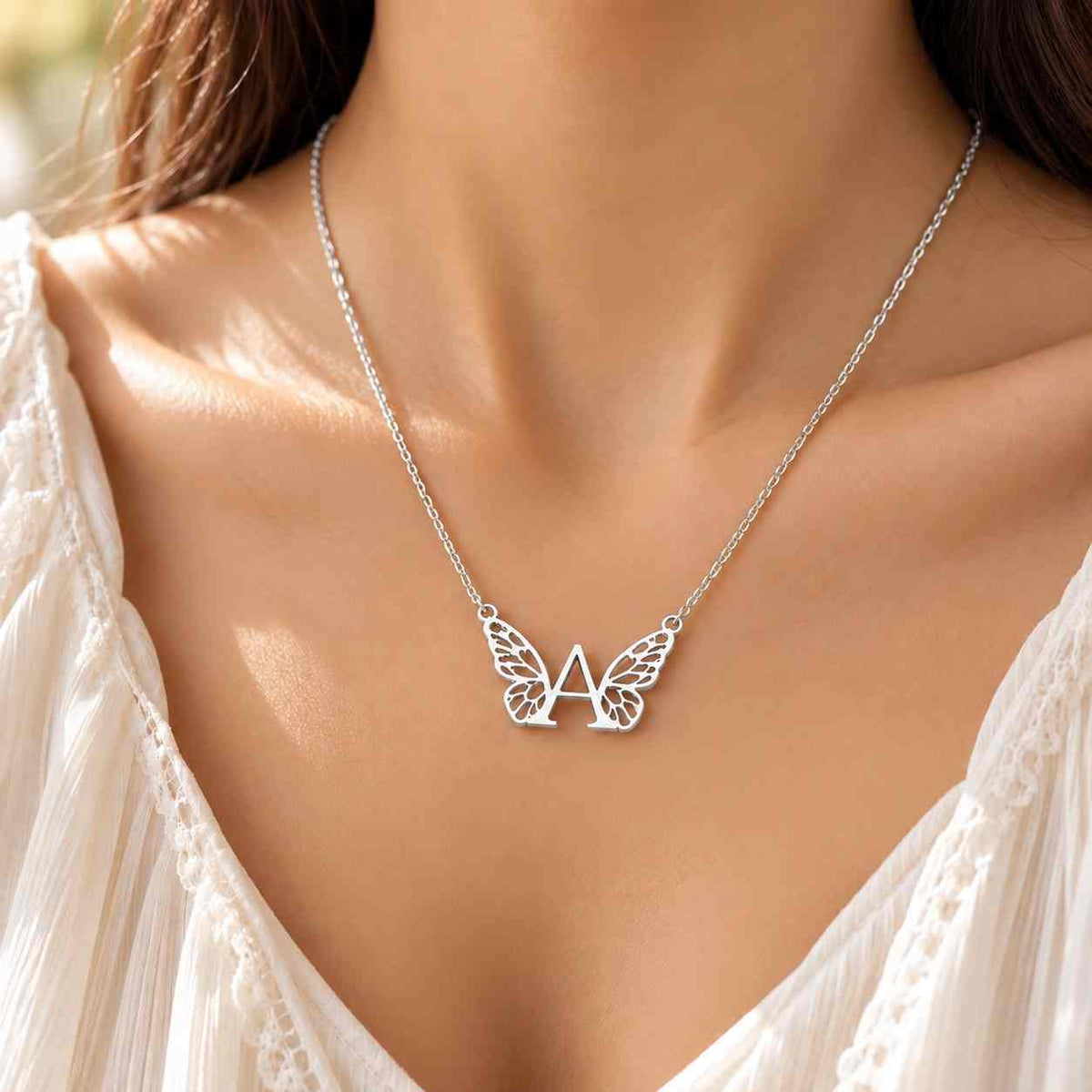 Ankx.in Initial Necklace for Women with A Initial and Butterfly Design in Silver Color