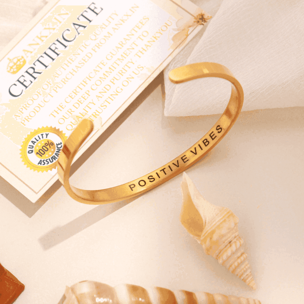 Ankx.in personalised name bracelet in gold tone featuring the phrase Positive Vibes for elegant style