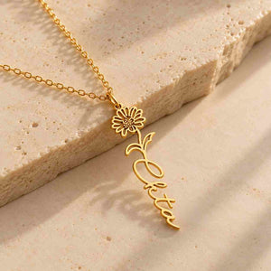 Personalized Flower Name Necklace in gold with floral design and custom name pendant